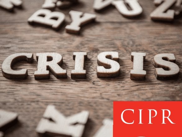 wooden letters spelling crisis and CIPR logo