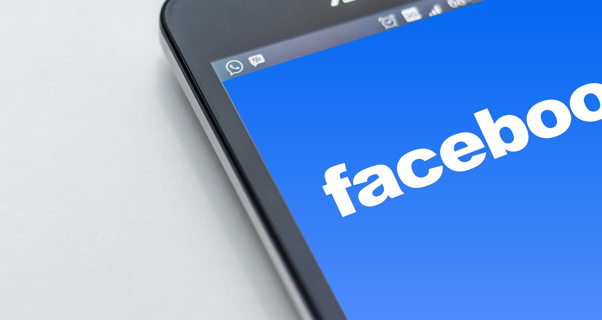 Mobile phone showing Facebook