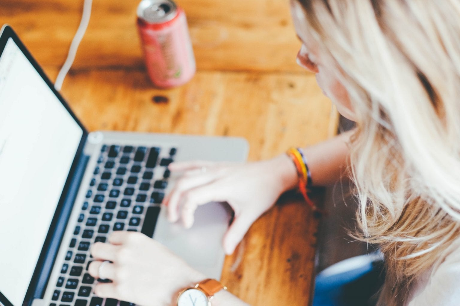 Photo of lady typing on computer